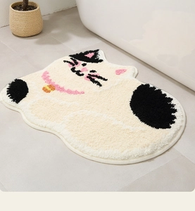 Close-up of cute cat-shaped plush bathroom mat with thick absorbent microfiber texture
