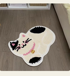 Close-up of soft plush cat-shaped bathroom mat featuring thick tufted texture and design