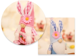 Close-up of Easter gnome dolls with bunny ears, plush beards and carrot details