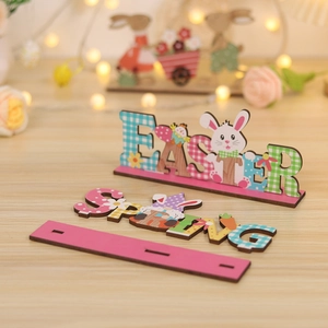 Easter and Spring themed wooden tabletop signs with colorful bunnies and flowers