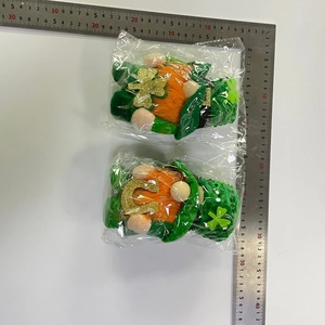 Detail view of St. Patrick's Day gnomes in packaging with measurement scale