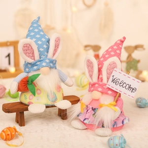 Lighted Easter Gnome dolls with bunny ears and floral patterns for holiday decoration
