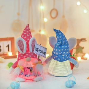 Lighted Easter gnomes with rabbit ears holding carrot and welcome sign for holiday decor