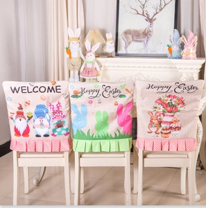 Detail of Easter chair covers with cartoon bunny prints and polka dot ruffle trim decor