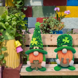 Pair of St. Patrick's Day gnomes with green sequin hats and lucky shamrock accents