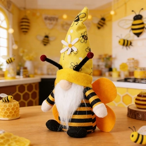 Detail of bee festival gnome plush with yellow striped hat and wings in cozy kitchen