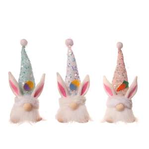 Three colorful Easter gnomes with sequin bunny ear hats and long white beards in a row