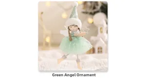 Detail of green handmade angel ornament with glitter star and soft tulle skirt for Christmas