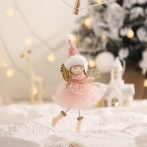Christmas angel doll ornament with pink tulle dress, plush hat and golden wings on a tree