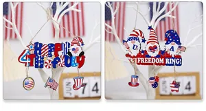 Detail of wooden gnome ornaments with American flag motifs and Independence Day greetings