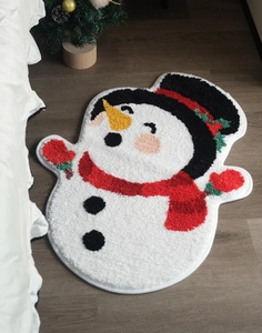 Close-up of tufted Christmas snowman rug texture with 3D flocking and non-slip backing