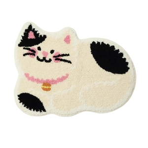 Cute cat shaped absorbent bathroom mat in cream white and black tufted plush fabric