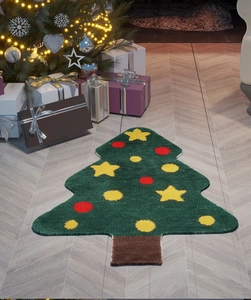 Macro view of Christmas tree shaped bath mat with plush texture and star details