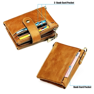 Detail view of brown vintage leather wallet with card slots and bronze zipper pockets