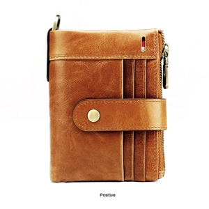 Detail of vintage brown leather wallet with RFID blocking slots and metal zipper