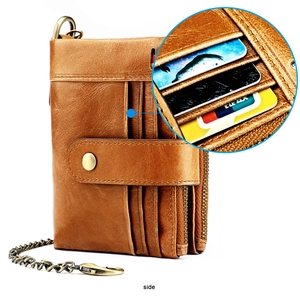 Detail view of vintage brown leather wallet with anti-theft chain and multiple card slots