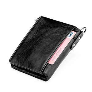 Detail of black pebbled leather card holder with RFID protection and metal D-ring