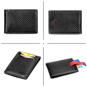 Detail of RFID blocking carbon fiber wallet featuring multi-slots and red pull strap tab