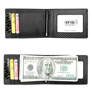 Detail of RFID blocking carbon fiber wallet showing card slots and metal money clip