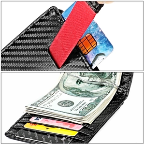 Detail view of carbon fiber RFID wallet with red elastic strap and metal money clip