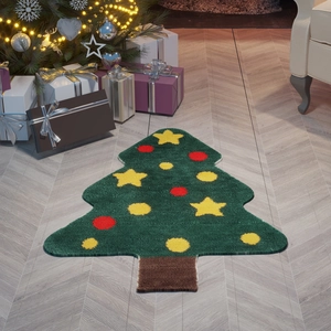 Christmas tree shaped flocked area rug with festive ornaments on a wooden floor