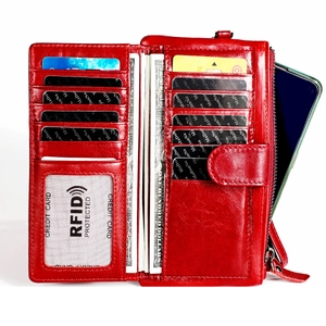Macro detail of red leather wallet interior with RFID card slots and cash compartments