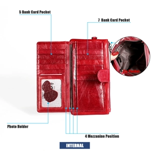 Detailed view of red leather long wallet interior with 12 card slots and zippered pocket