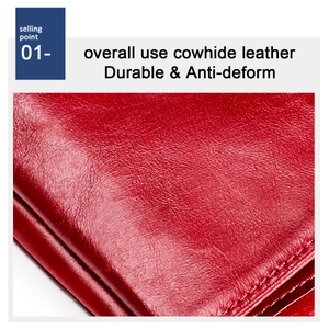 Detail of red genuine cowhide leather wallet showing durable lychee texture and stitching
