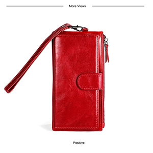 Detailed view of red leather long wallet featuring a detachable wristlet and fine stitching