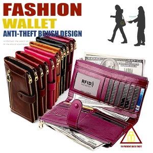 Detail of RFID blocking long leather wallet showing multiple card slots and dual zip compartments