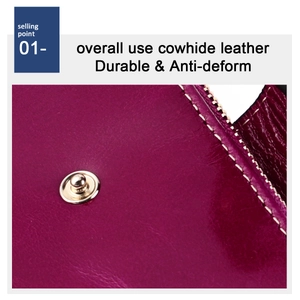 Detail of durable cowhide leather wallet with metal snap button and precision stitching