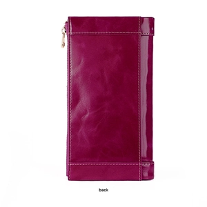 Rear view of a long leather wallet in deep purple with white stitching and metal zipper