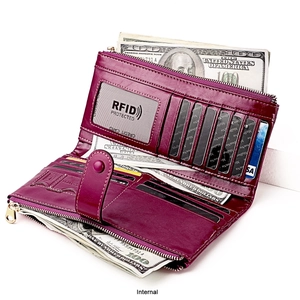 Internal view of purple leather long wallet with RFID card slots and dual zipper layers