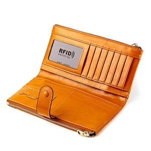 Detail view of leather wallet interior with multiple card slots and RFID protection pocket