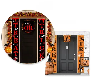 Detail of Trick or Treat Halloween door banners with pumpkins and spider webs