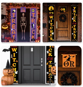 Detail of Halloween porch banners featuring skeletons, pumpkins, and a haunted castle