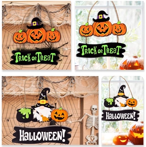 Détail de suspensions d'Halloween en bois avec citrouilles et texte Trick or Treat