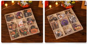 Close-up of Halloween wooden pendant set with pumpkin, ghost, and cat motifs in boxes