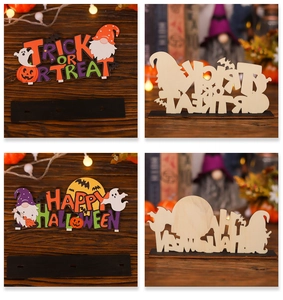 Detail of Trick or Treat and Happy Halloween wooden gnome signs with pumpkin elements