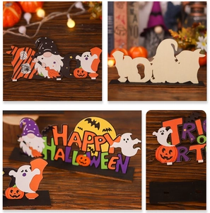 Detail of wooden Halloween table signs featuring gnomes pumpkins and spooky lettering