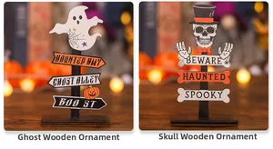 Detail of wooden Halloween tabletop signs with ghost, pumpkin and skull designs on wood base