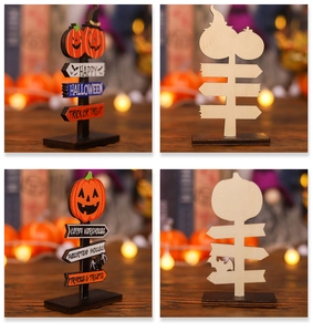 Detail of wooden Halloween signs featuring pumpkin and bat motifs with Trick or Treat text