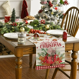 Detail of Christmas table runner with gingerbread and Have a Sweet Christmas text