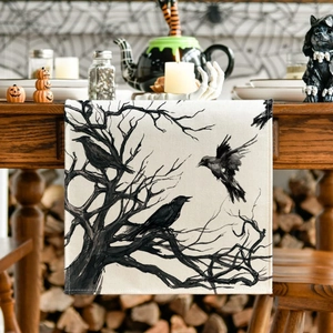 Halloween table runner featuring black crows and dead trees on linen fabric for dining decor