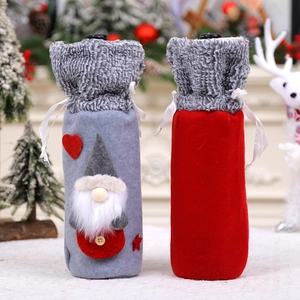 Christmas gnome wine bottle covers with plush fur collars and heart star decorations