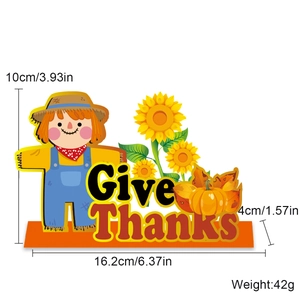 Detail showing dimensions and Give Thanks text of the wooden Thanksgiving scarecrow ornament