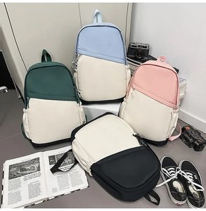 Four minimalist nylon backpacks in trendy color-block styles for business and school