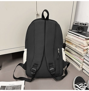 Detail of backpack back with wide shoulder straps and a hidden vertical zipper pocket