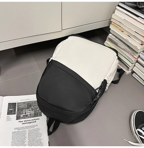 Detail of minimalist black and white waterproof nylon backpack for business commute