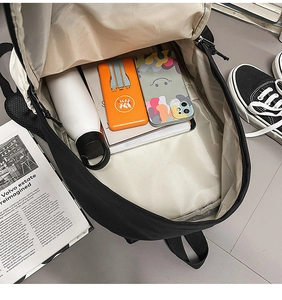 Internal view of waterproof business laptop backpack with spacious compartments for gadgets